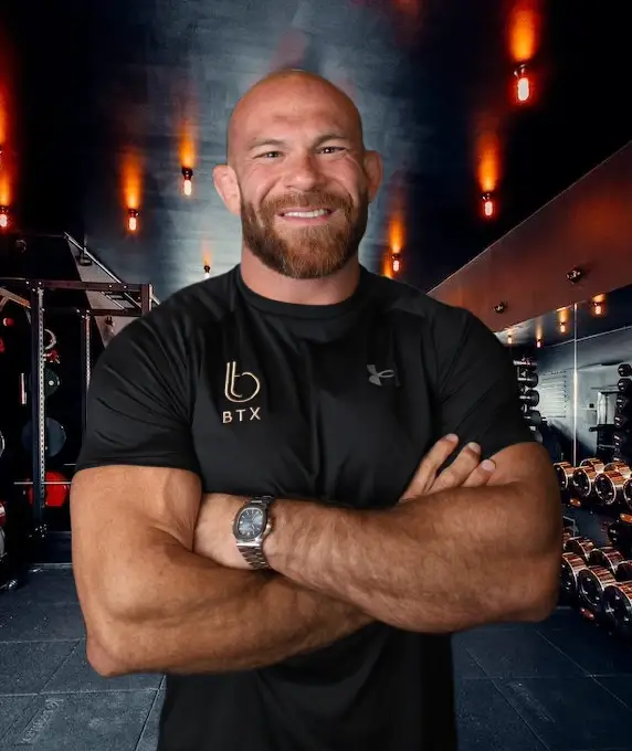 James Cooper, founder of BTX, arms crossed in the studio